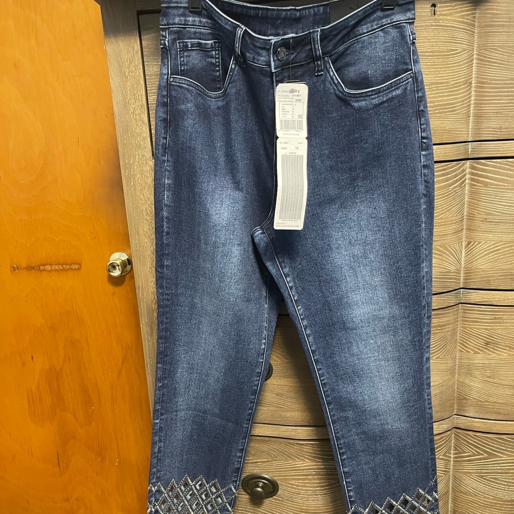 Joseph Ribkoff jeans with sparkly stones and cutout at ankle.